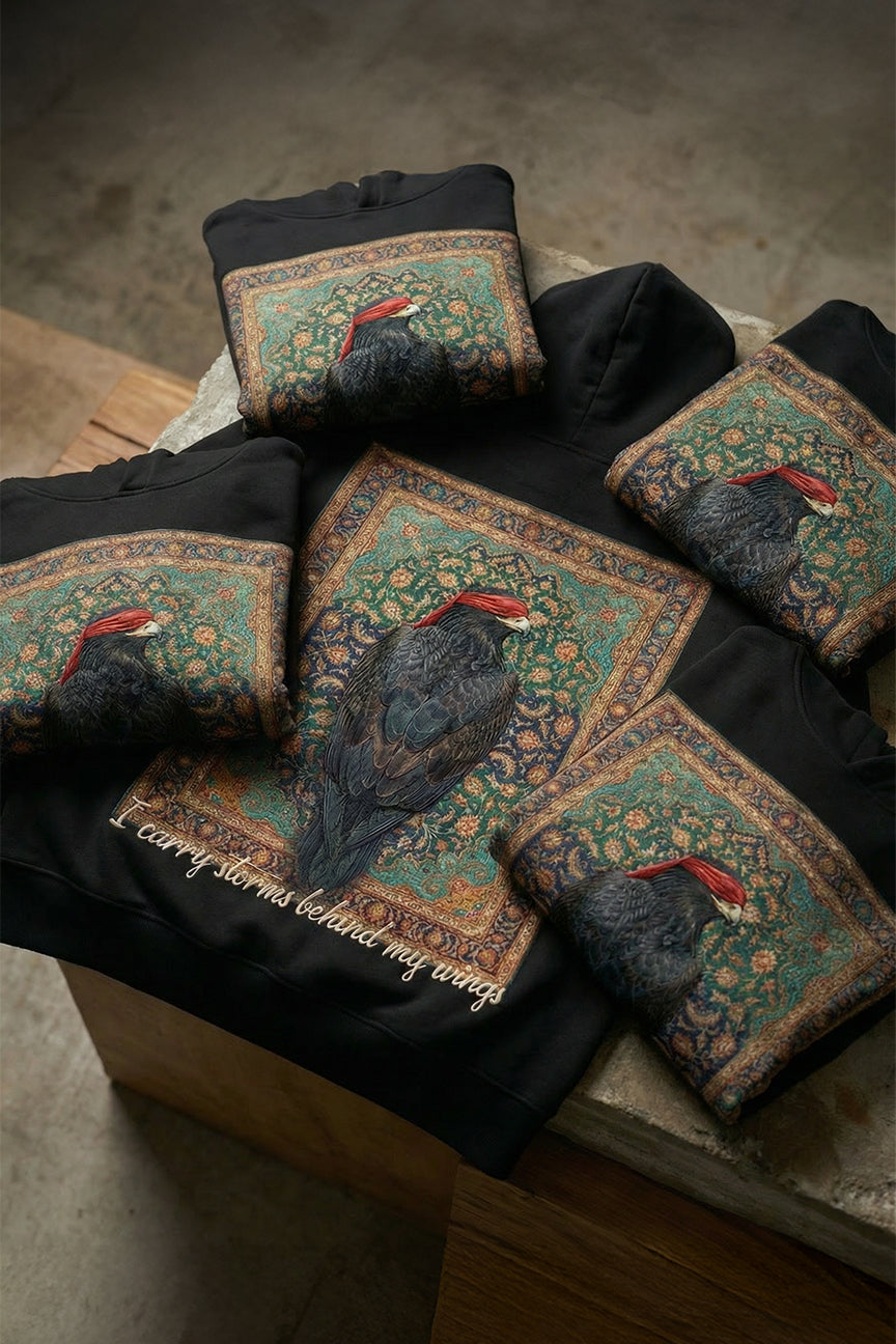 Blindfolded Eagle Arabic Art Hoodie! I Carry Storms Behind My Wings